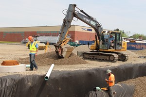 construction workers installing drainage