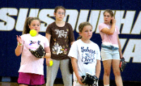girls at softball camp