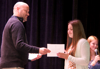 student receives certificate