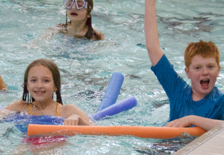 Kids play in pool