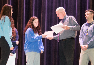 students receive certificates