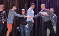 student receives certificate