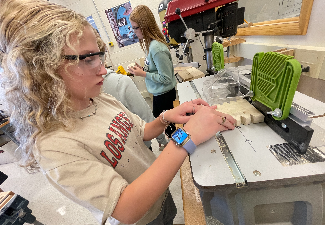 students work in wood shop