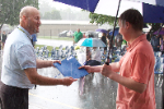 rainy diploma hand off