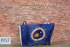 O'Neils and Mr. Hutchinson with flag