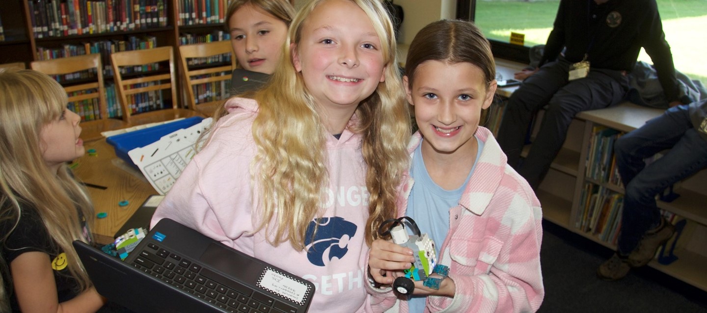 students with Lego robot