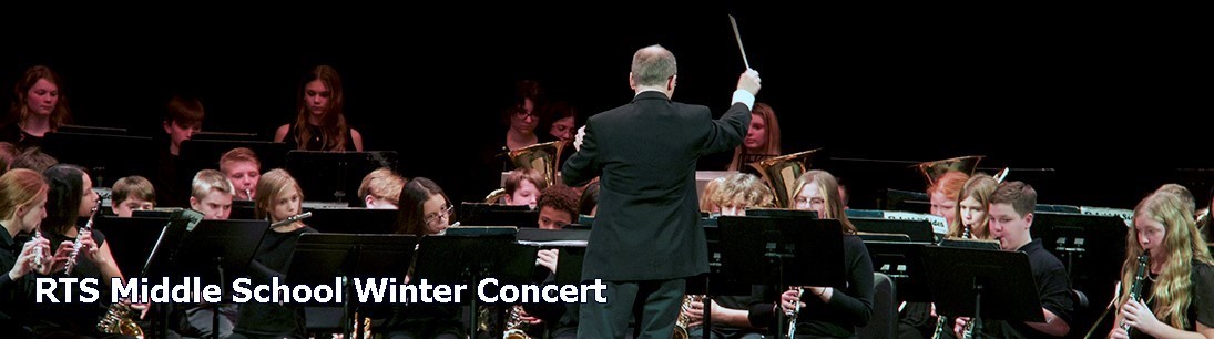 Teacher conducts orchestra at RTS winter concert