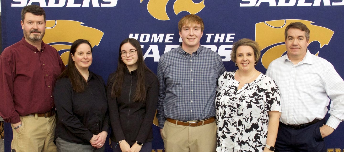 2023 Valedictorian and Salutatorian with parents