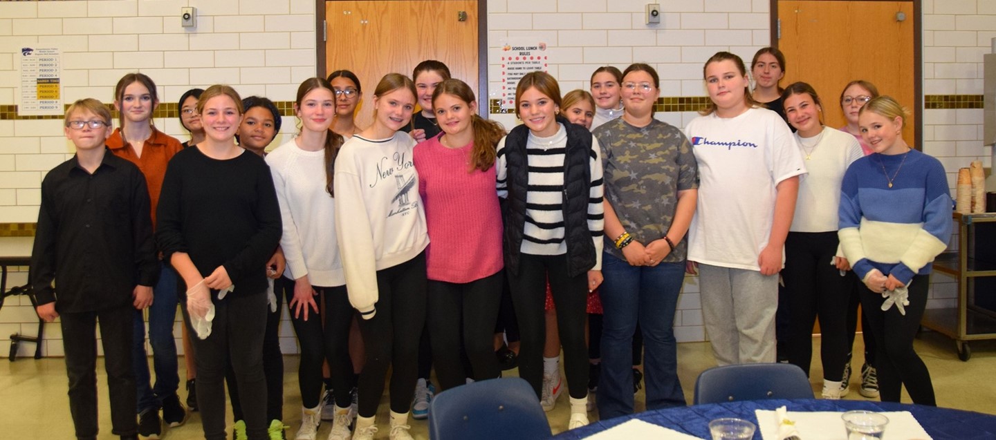 Richard Stank Middle School students helping at the Thanksgiving luncheon for Senior Citizens
