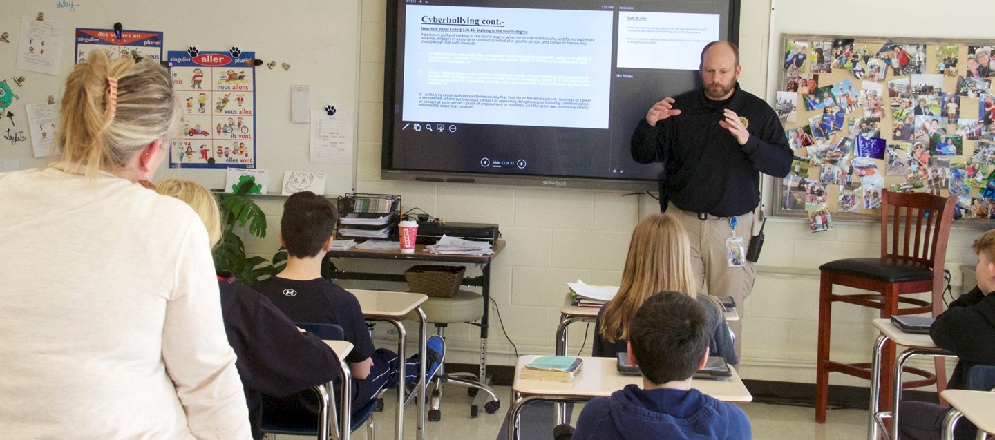 school resource officer presents to classroom